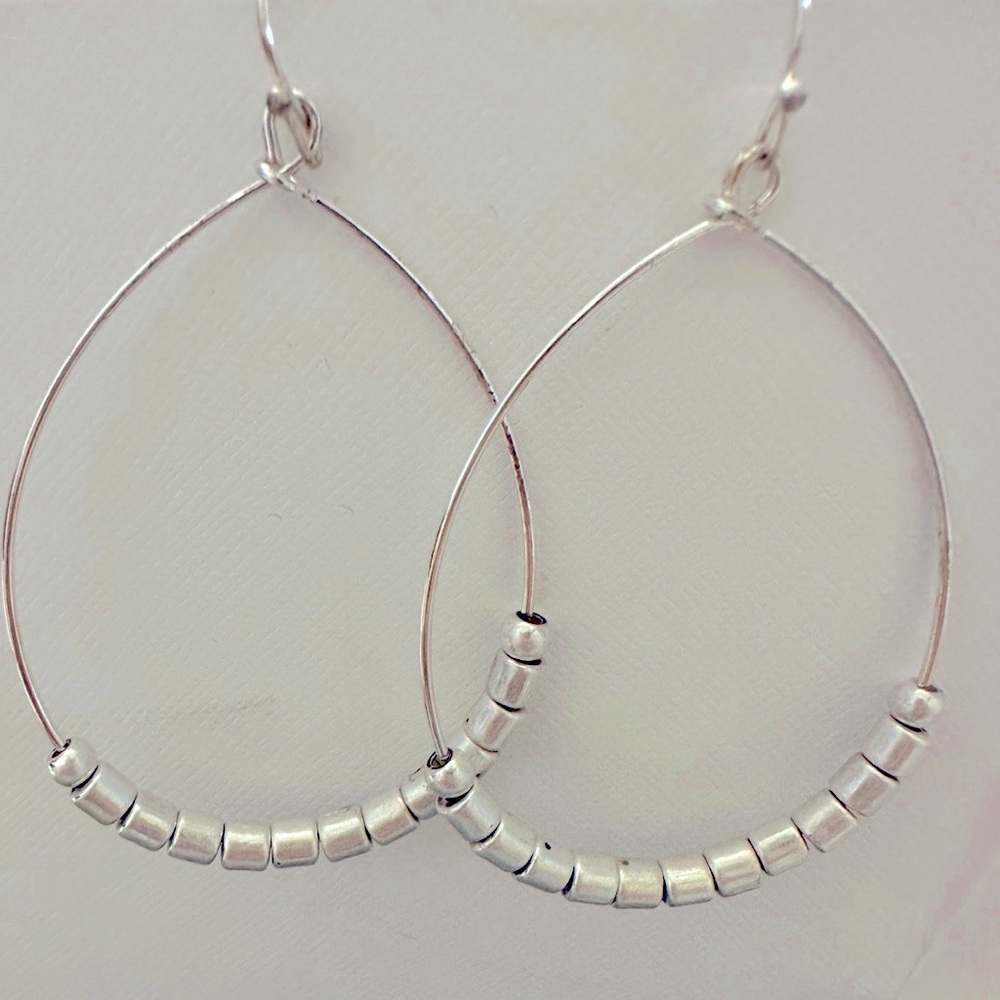 Silver toned artisan style earrings! Nickel free
